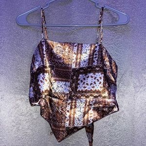 Size small women’s crop top that ties in the back